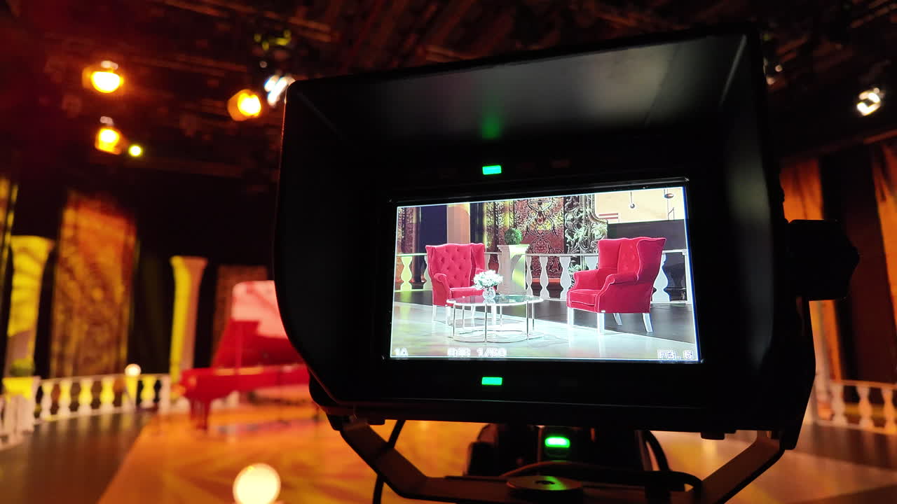 Professional camera filming on the backstage of a TV set