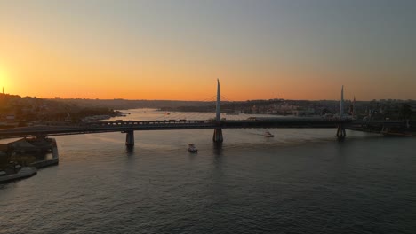 4k cinematic drone footage golden hour at haliç altin boynu bridge in istanbul - turkey_01