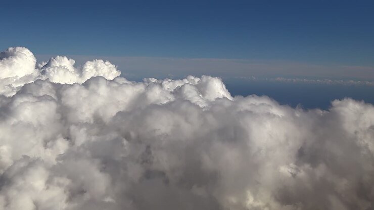 hyperlapse taken from a jet cockpit while flying over a layer of cottony clouds, doing some abrupt turns