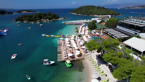 white sand, azure sea, sunbathing, umbrellas, ksamil islands, boats, and summer holiday fun by the seaside, exotic beauty of albania