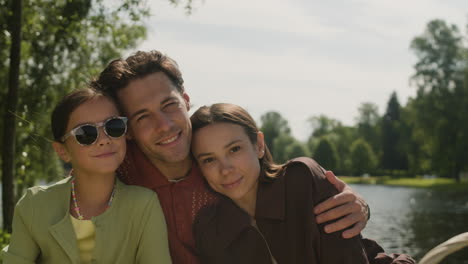 family portrait by the lake