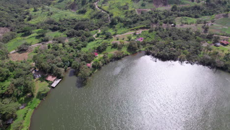 Lush-san-carlos-landscape-with-winding-paths-and-a-serene-lake,-aerial-view