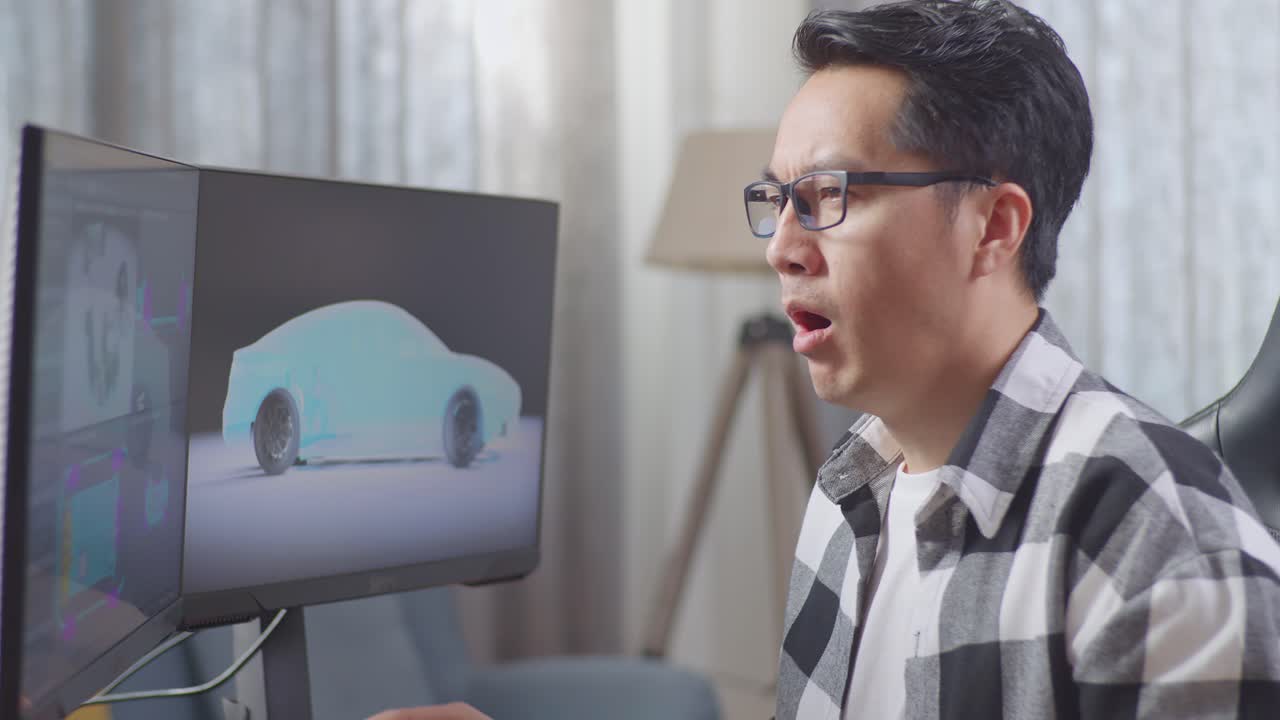 피곤한 디자이너가 일터에서 잠을 자고 있습니다.