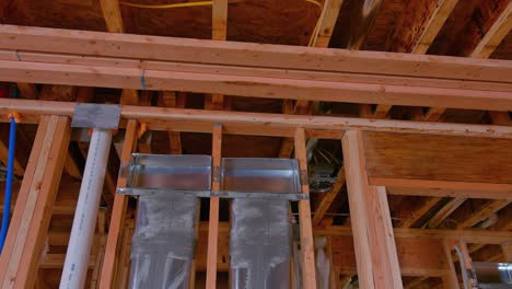 residential house with wooden frame under construction house