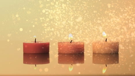 animación de puntos de luz sobre tres velas