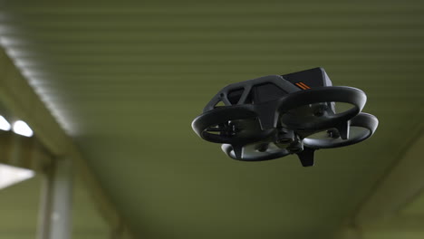 close up of fpv quadcopter drone hovering and