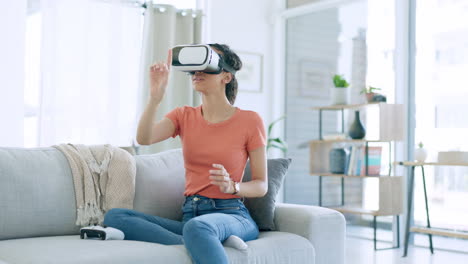 woman using vr headset on a couch