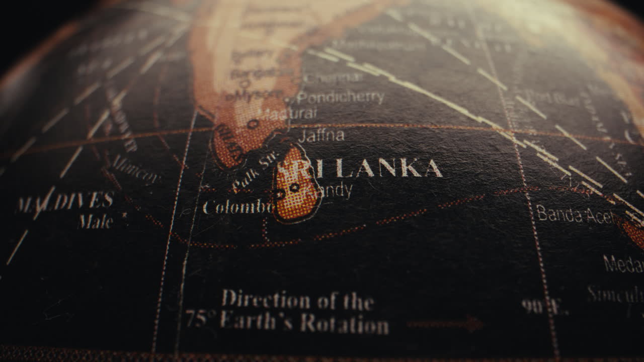 Close-up of a vintage globe, focusing on Sri Lanka