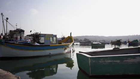 tiny residency fishing boats anchored at marsaxlokk malta dock