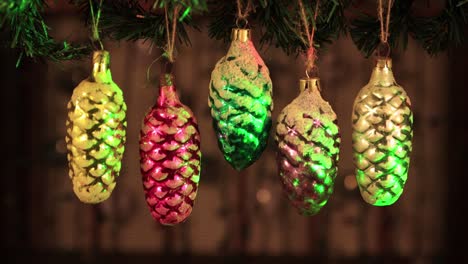 christmas decoration - vintage pine cone toys with green laser beams.