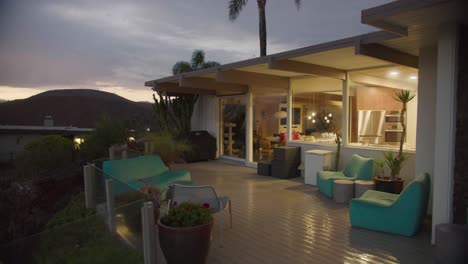 mid century moden home on the hillside of los angeles after the rain at dusk