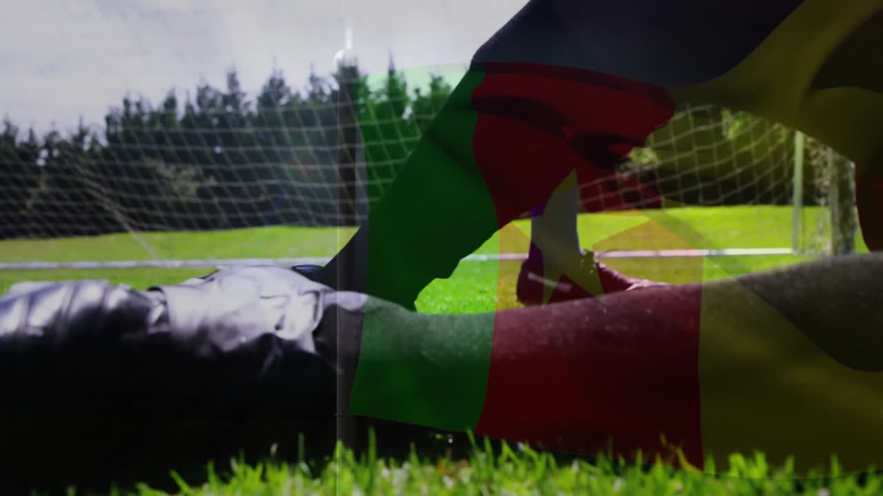 Kicking football, player on field with Cameroon flag in animation background