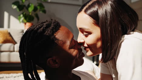 an intimate and tender moment shared between a couple at home