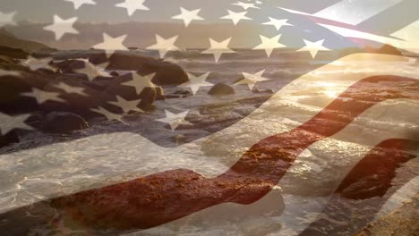 Beach-scenery-at-sunset-with-an-american-flag