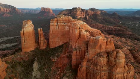 Top-Down-aerial-view-pulling-away-reveal-of-Cathedral-Rock-in-Sedona-Arizona-at-sunset