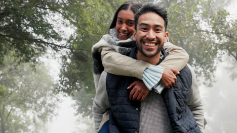 Smile,-face-of-couple-and-piggyback-in-park