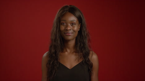 young woman smiles at camera
