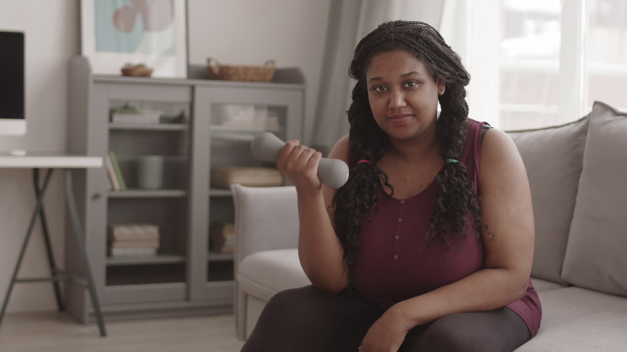 Portrait of African-American Sporty Woman Having Workout