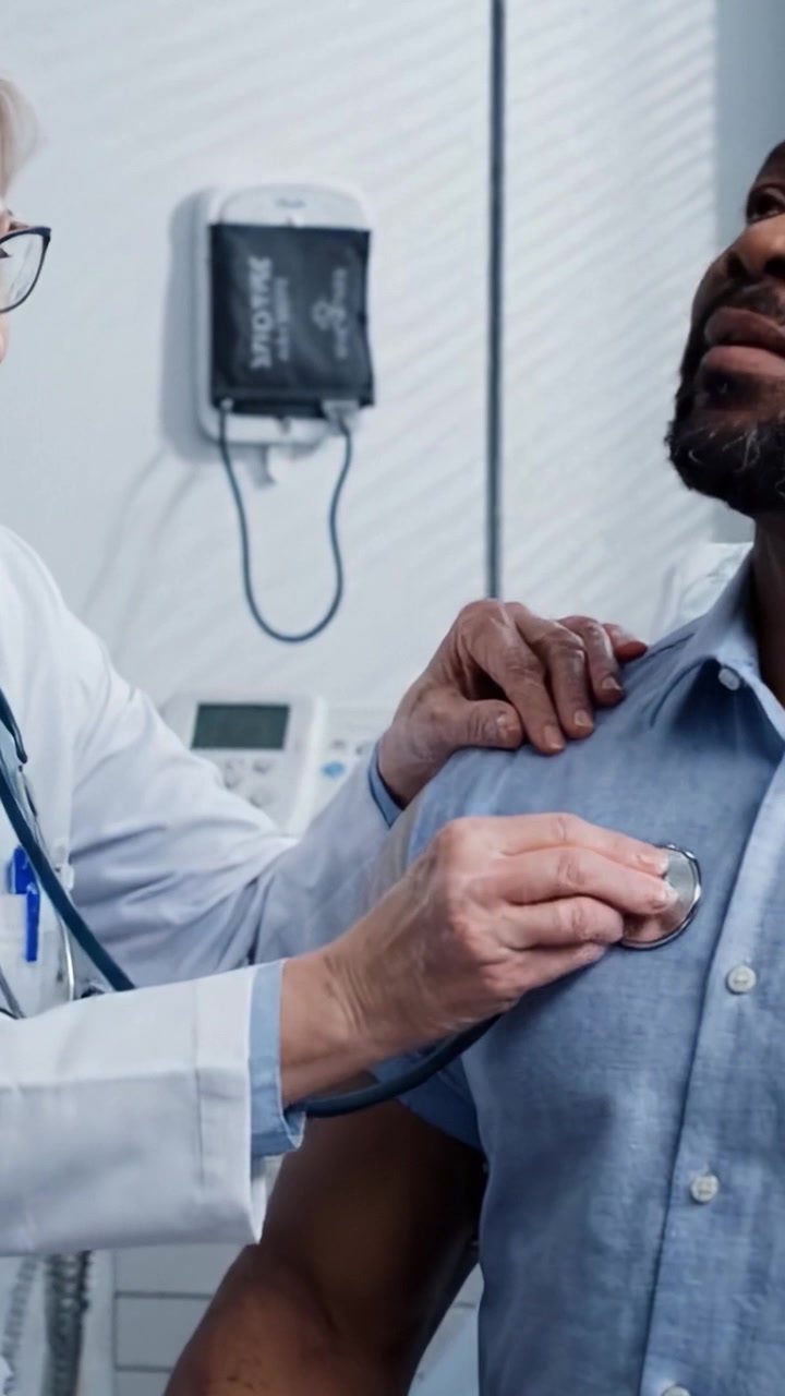 Medical Checkup In Progress: A Doctor Taking Blood Pressure of a Patient in a Clinical Setting for Health Assessment and Monitoring