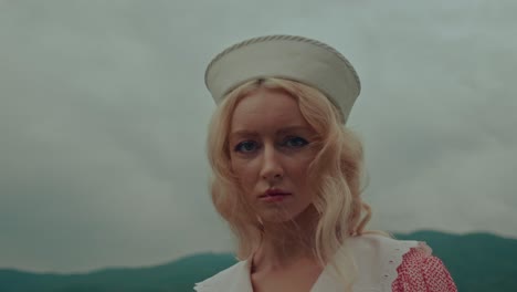 blonde woman in vintage nurse outfit