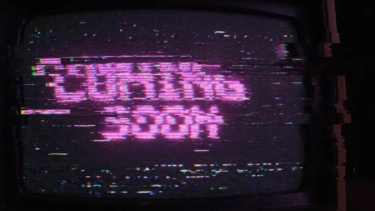 A Retro Television Screen Displaying 'COMING SOON' with Glitch Effects, Evoking Nostalgia for Classic Media and Upcoming Content Reveal.