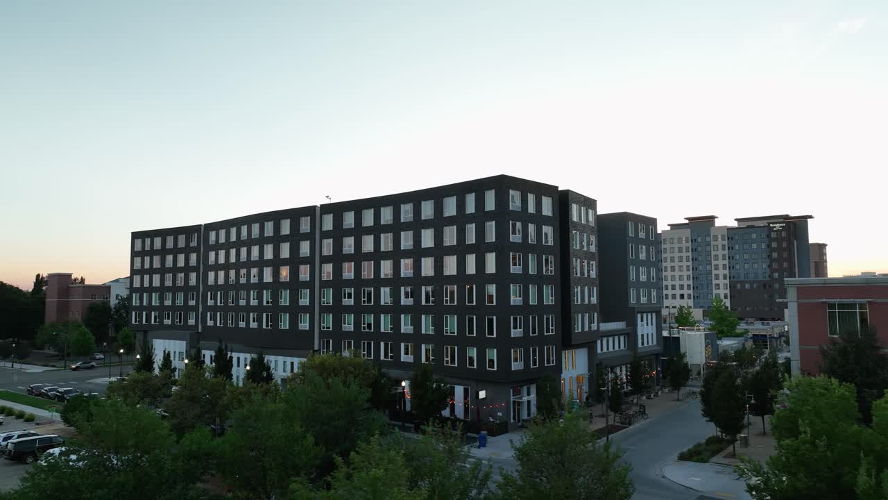 Exterior view of large, modern apartment or student housing building, Boise Idaho