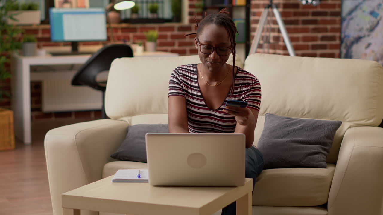 Woman working on laptop at home