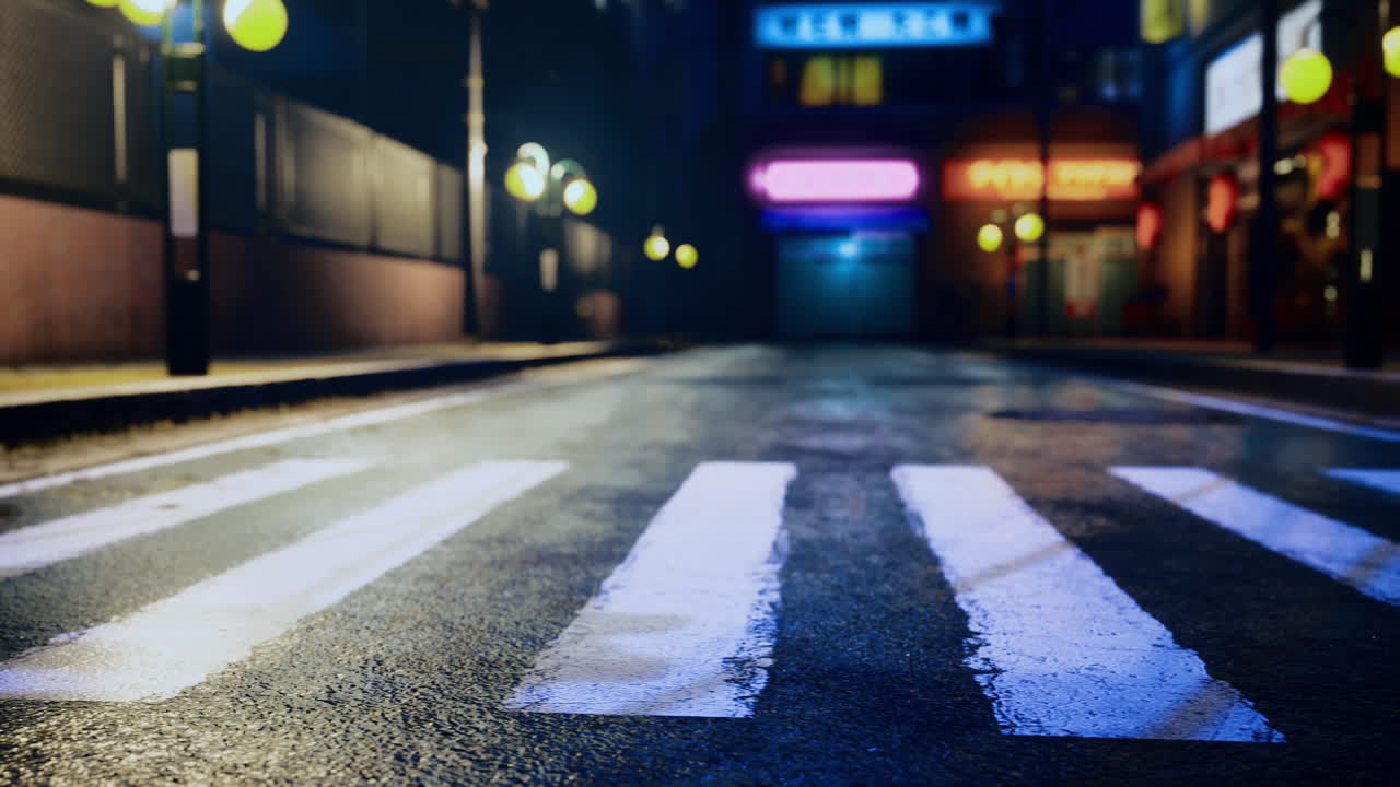 Quiet urban street illuminated by colorful lights at night