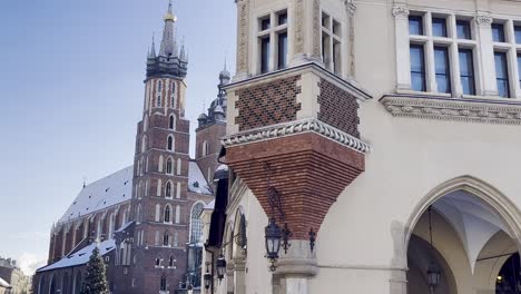 St-Mary's-Basilica-in-Krakow-Old-Town-Square-behind-Cloth-Hall---in-winter