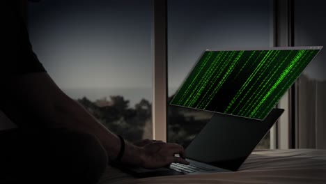 Hacker typing on laptop with green binary code interface
