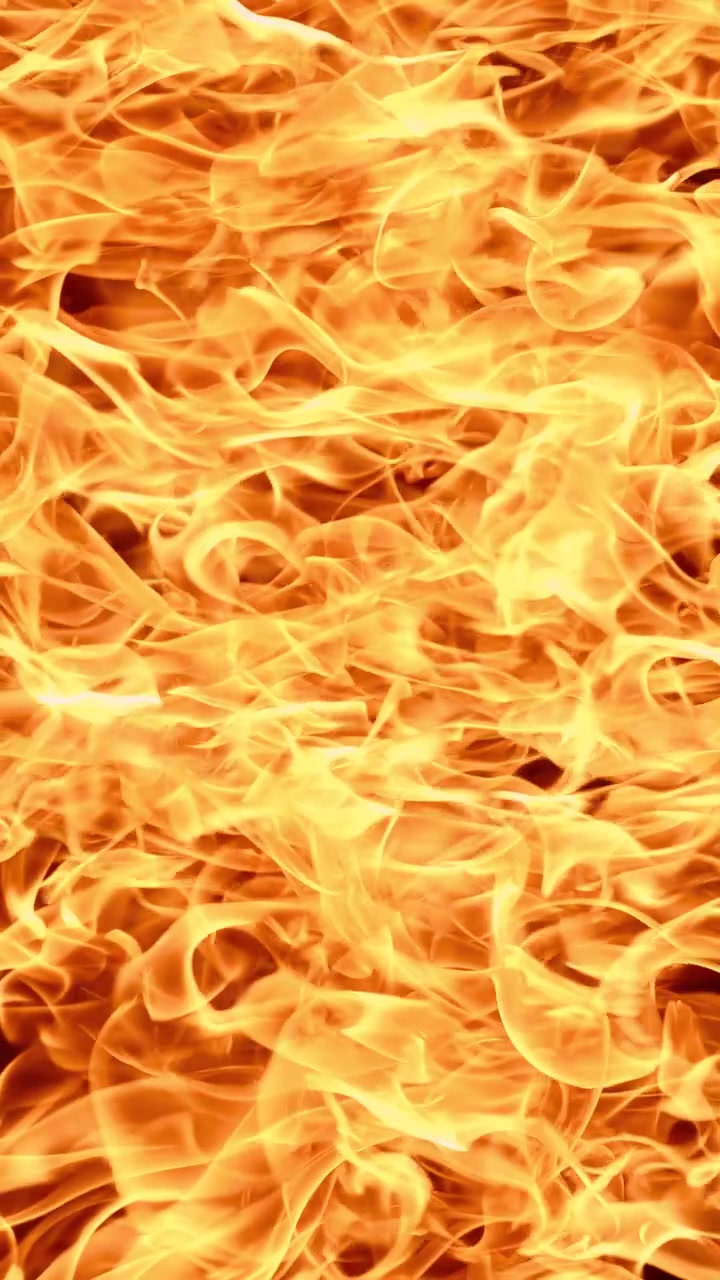 Sfondo astratto con fiamme di fuoco arancioni, video verticale