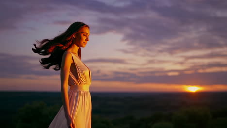 woman in dress at sunset