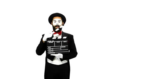 mime holding clapperboard