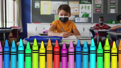 Animation-of-colourful-pencils-over-diverse-schoolchildren-with-face-masks