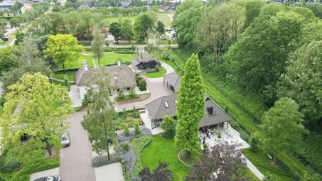 beautiful aerial overview of a modern and luxurious restaurant with people on the large outdoor terrace