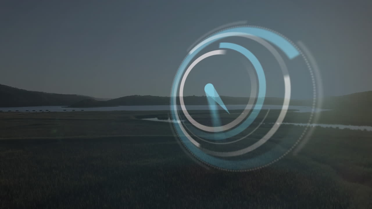 animación de reloj digital sobre vista aérea de paisaje verde con lago y montañas contra el cielo