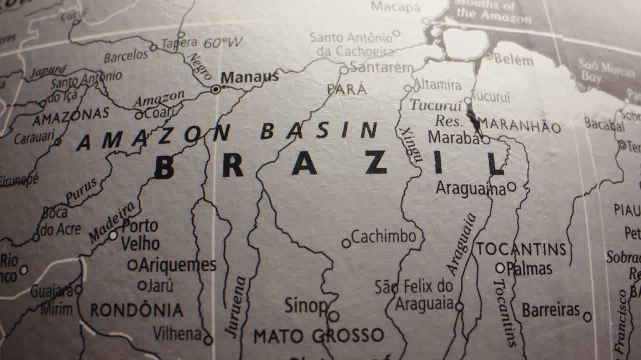 Close-up of a globe highlighting Brazil and the Amazon Basin