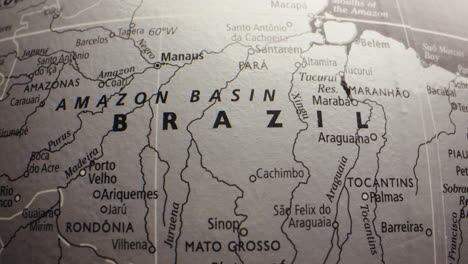 close-up of a globe highlighting brazil and the amazon basin