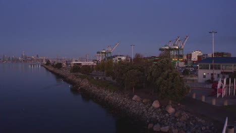 Low-light-early-morning-pass-to-reveal-city-and-urban-surroundings