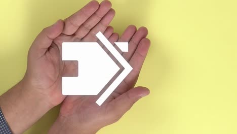 hands of a person opening themselves and animation of a symbol of a house appearing on them