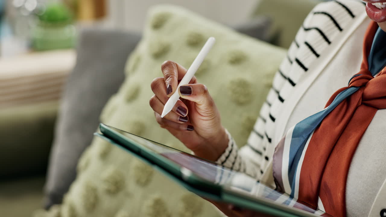 Woman using digital tablet with stylus