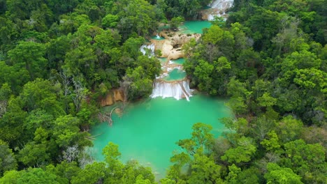 beautiful cascadas de roberto barrios waterfall in mexico, 4k aerial arc shot