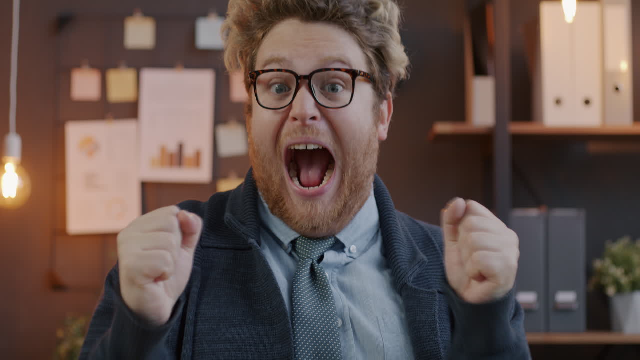 Excited Businessman in Office