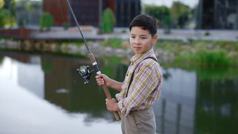 boy fishing in a park