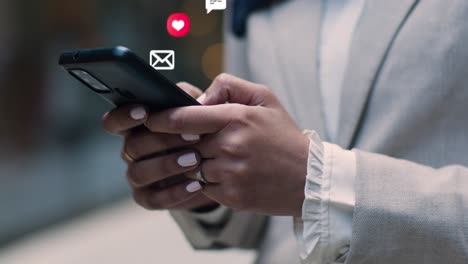 Close Up Of Muslim Businesswoman Standing Outside City Offices Looking At Mobile Phone With Motion Graphics Emojis Showing Multiple Networking Messaging And Social Media Notifications