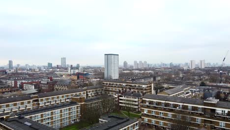drone shot flying over residential housing in east london suburb