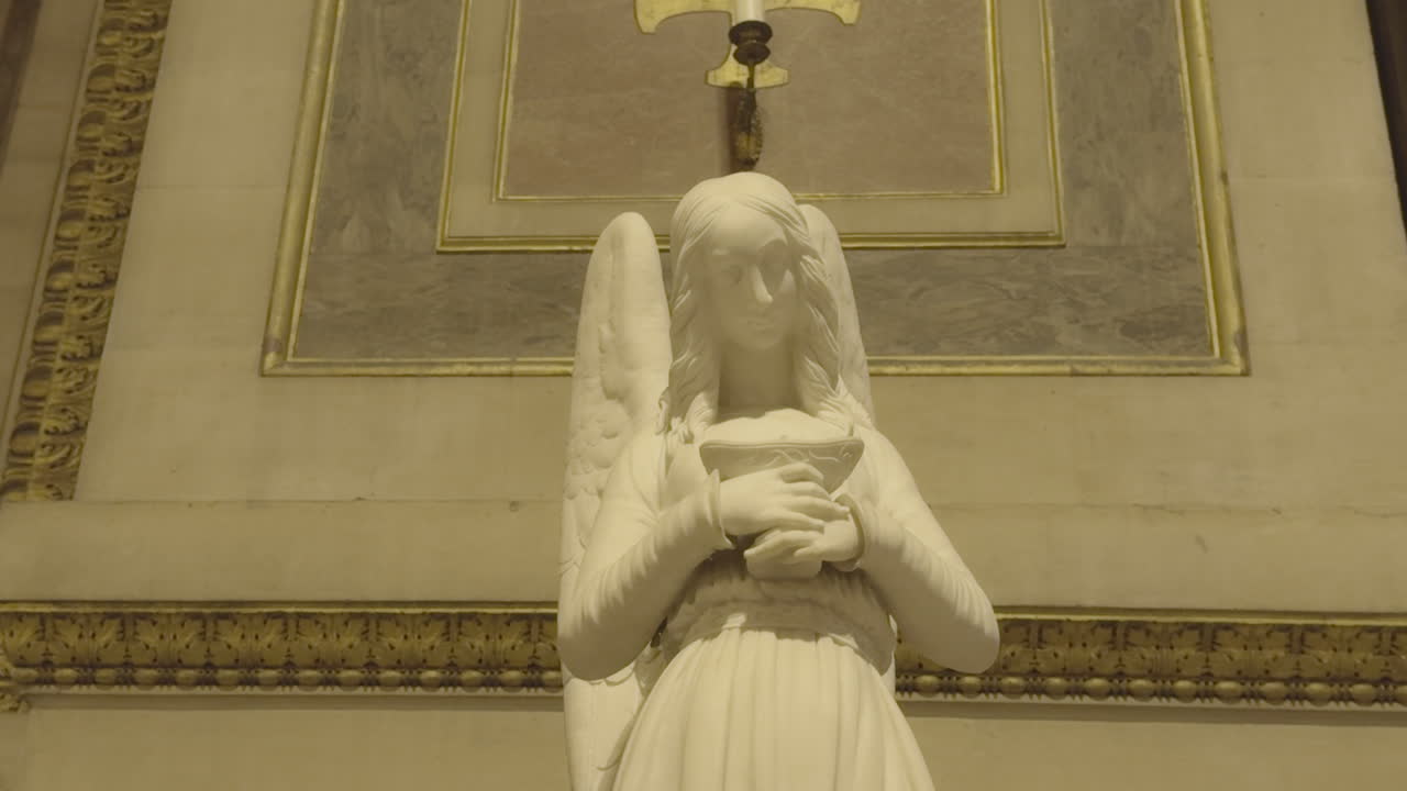 Angel statue in church of La Madeleine, Paris in France