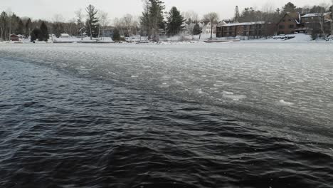 Freezing-lake-waves-ripple-aerial-4K