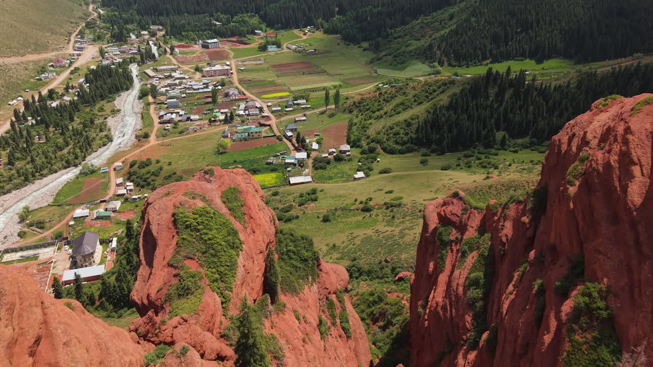 The Broken Heart Rock - Famous Red Sandstone Rock Formation In Jety-Ögüz Gorge, Kyrgyzstan. Aerial Drone Shot