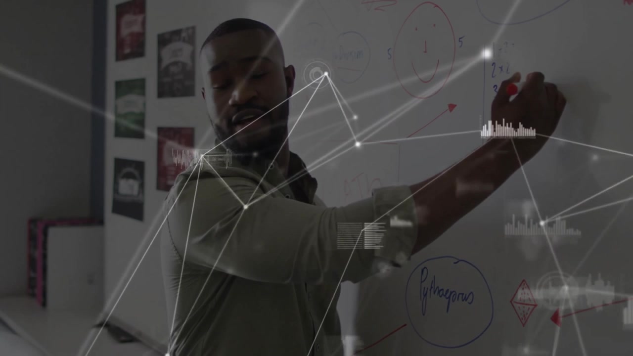 Instructor picking up red marker, writing Pythagoras principle on whiteboard teaching via AR HUD